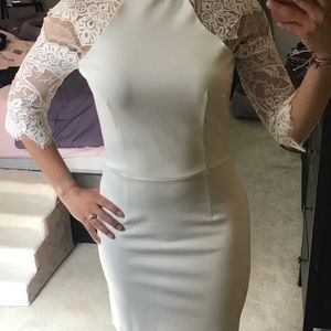 Short white dress with lace sleeves